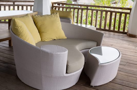 wicker sofa with cushions on the porch tropical hotel