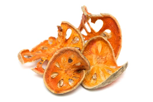 Bale Fruit dried tea isolated on the white background. Bale fruit is tropical fruit with hard exterior cover and has medicinal value for digestive system.