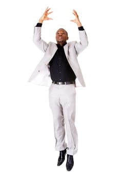 Businessman catching something , isolated