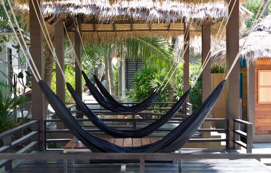 hammock sitting on the deck of an Outer Banks beach house.