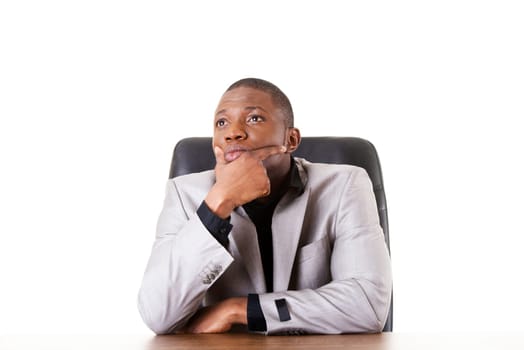 Thoughtful businessman at the desk