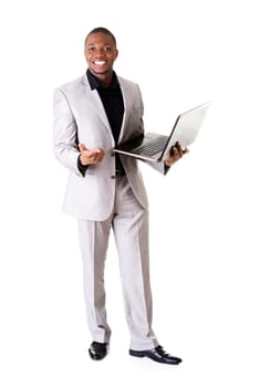 Happy businessman with laptop. Isolated on white
