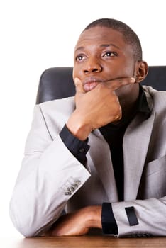 Thoughtful businessman at the desk