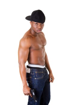 Afro american man standing with gun in hand. Thug and gangsta concept.