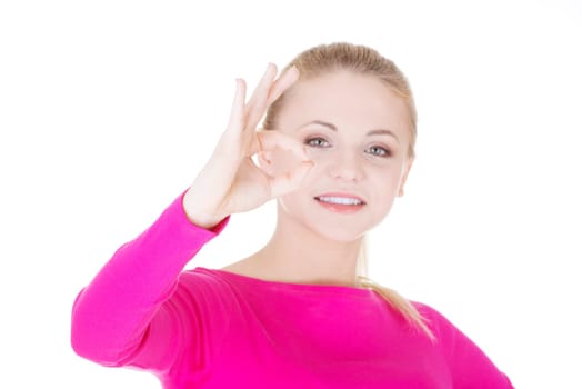 Happy teen girl gesturing perfect, isolated on white