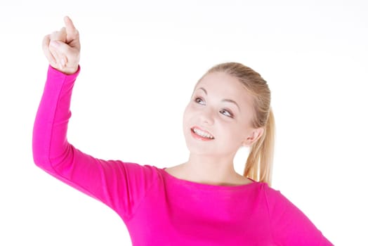 Young blond woman making choose on abstract screen