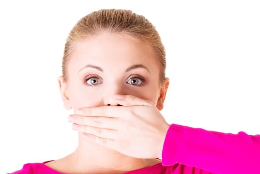 Young woman covering her mouth, isolated on white