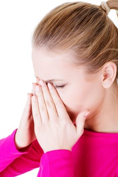 Young woman with sinus pressure pain , isolated on white