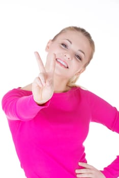 Happy young teenager girl showing victory sign ,isolated on white background
