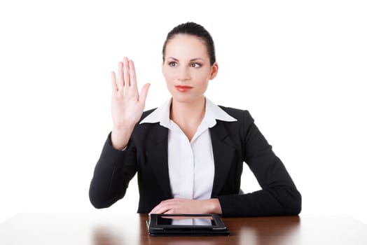 Businesswoman working on tablet computer with touch pad. Isolated on white.
