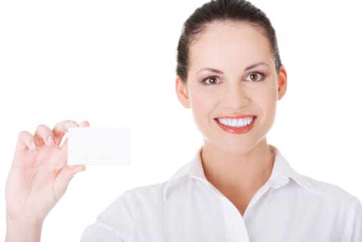 Beautiful smiling businesswoman with businesscard. Isolated on white
