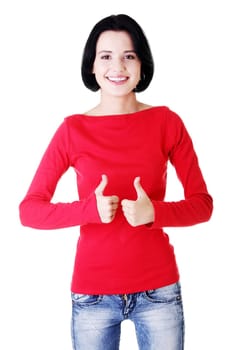 Beautiful young woman in casual clothes gesturing thumbs up.