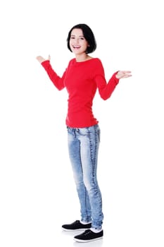 Excited happy young woman with hands up, isolated