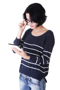 Beautiful happy young caucasian woman using tablet computer , isolated on white