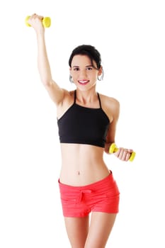 Fitness girl is working out with dumbbells , isolated on white background