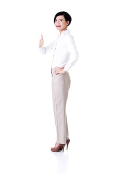 Happy smiling business woman with ok thumbs up gesture
