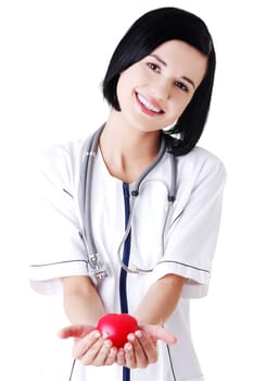 Young nurse with heart in her hand