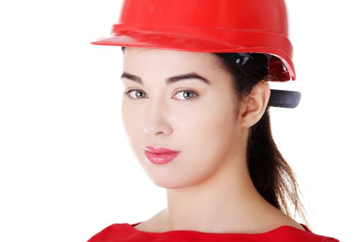 Portrait of confident female worker in helmet. Isolated on white