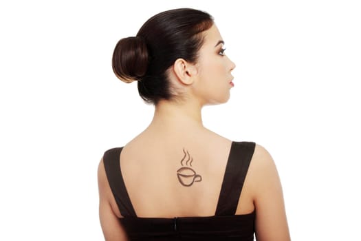 Elegant woman in dress with coffee symbol on her back.