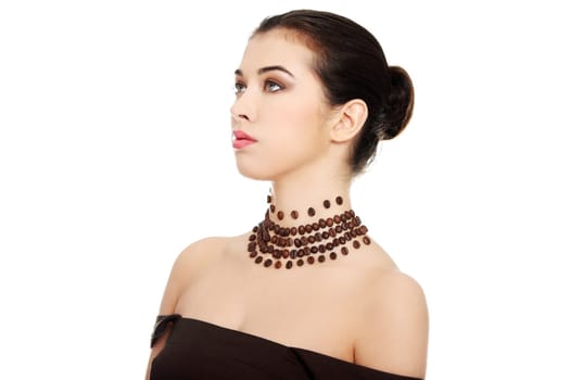 Beautiful elegant young woman with necklace made frome coffee beans, isolated on white