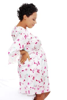 Pregnant woman heaving back pain, isolated on white background