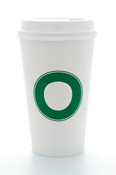 paper coffee cup with green circle for your text or log and with plastic top isolated on white background