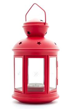 beautiful red antique style lantern with candle inside isolated on white background