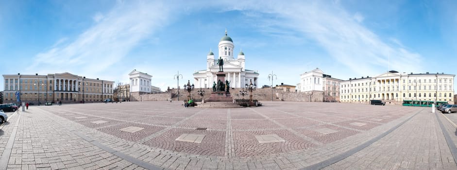 panorama view of the Helsinki cathedral square with blue cloudy sky in background