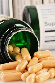 Composition with dietary supplement capsules. Drug pills