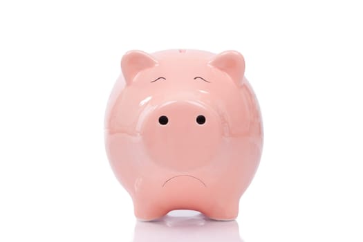 Sad piggy bank isolated on white background