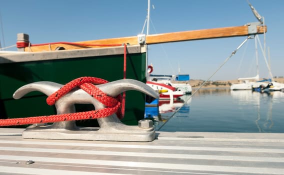 Detail of a floating dock with mooring bitts