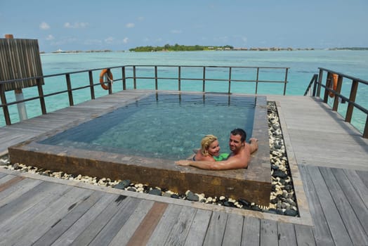 happy young  couple at summer vacation have fun and relax at beautiful sunny  day
