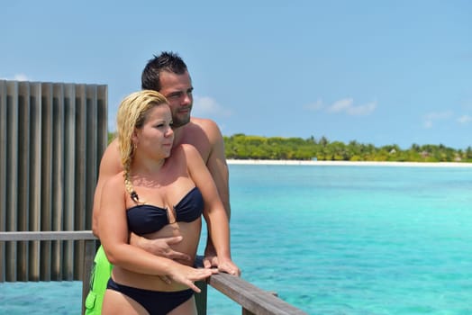 happy young  couple at summer vacation have fun and relax at beautiful sunny  day