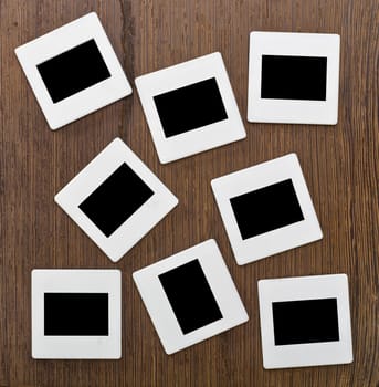 Slides on wooden background