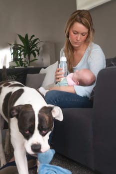 Happy young parents and their little baby