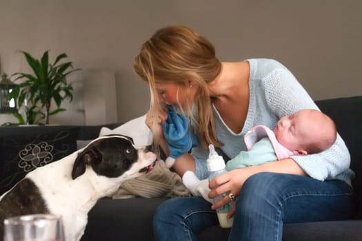 Happy young parents and their little baby