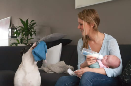 Happy young parents and their little baby