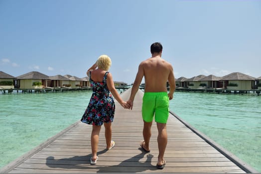 happy young  couple at summer vacation have fun and relax at beautiful sunny  day