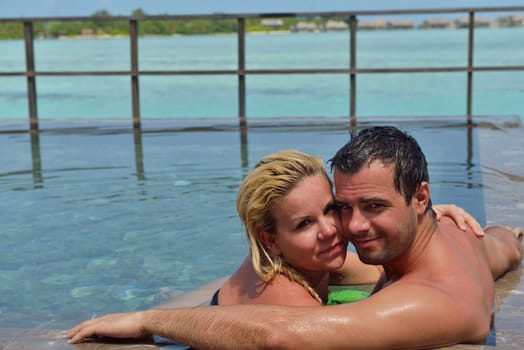 happy young  couple at summer vacation have fun and relax at beautiful sunny  day