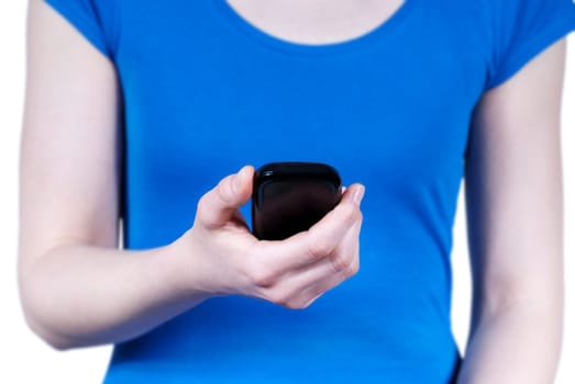 a woman holds a mobile phone in one hand, isolated