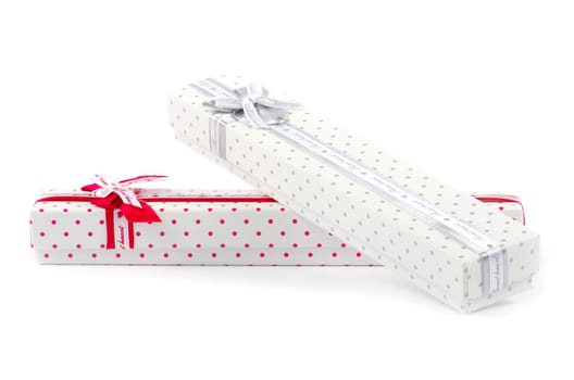Christmas box gifts with satin bow isolated on white background