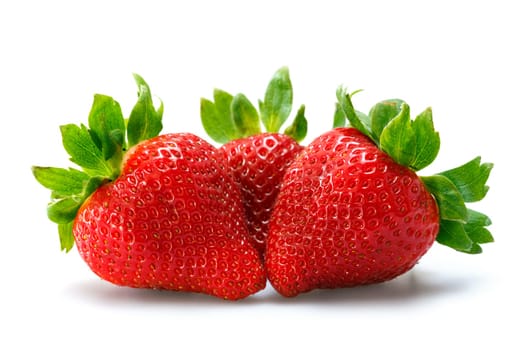 strawberries over white background