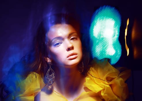 Motion. Stylized Woman in Radiant Abstract Lights. Illusion
