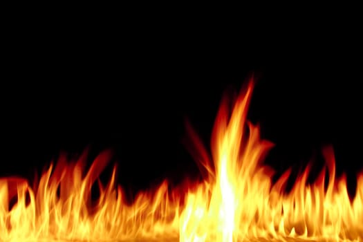 photo of the real flame isolated on black with space for you text