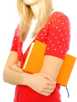 young girl isolated on white background standing with book in her hand