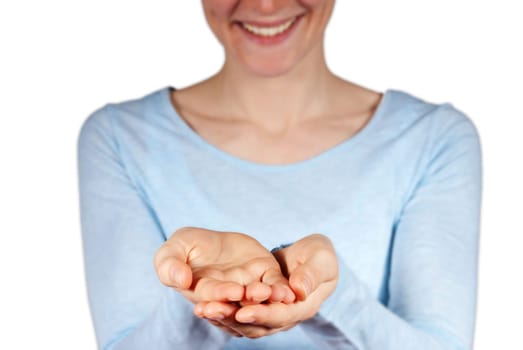 a woman holding up her hands with free space on them, isolated