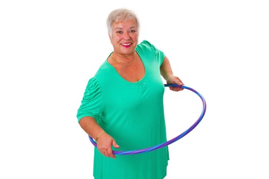 Senior woman with hula hoop isolated on white background