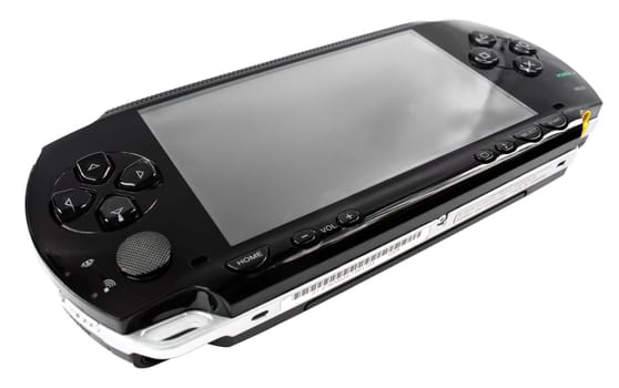 photo of the play station portable video game console isolated on white