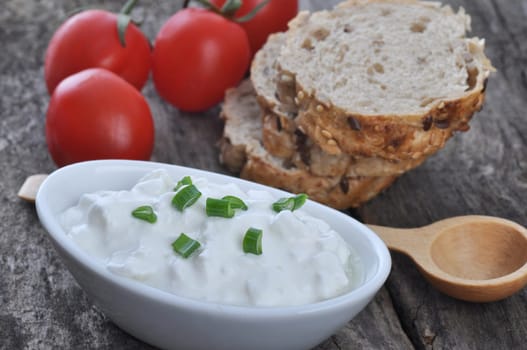 Cottage cheese on a wooden table