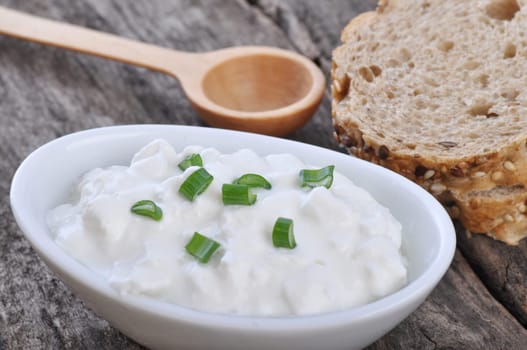 Cottage cheese on a wooden table